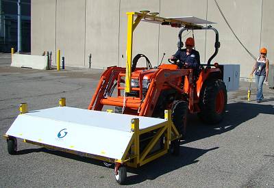 Ground survey of a nuclear facility to locate and identify contaminated particles